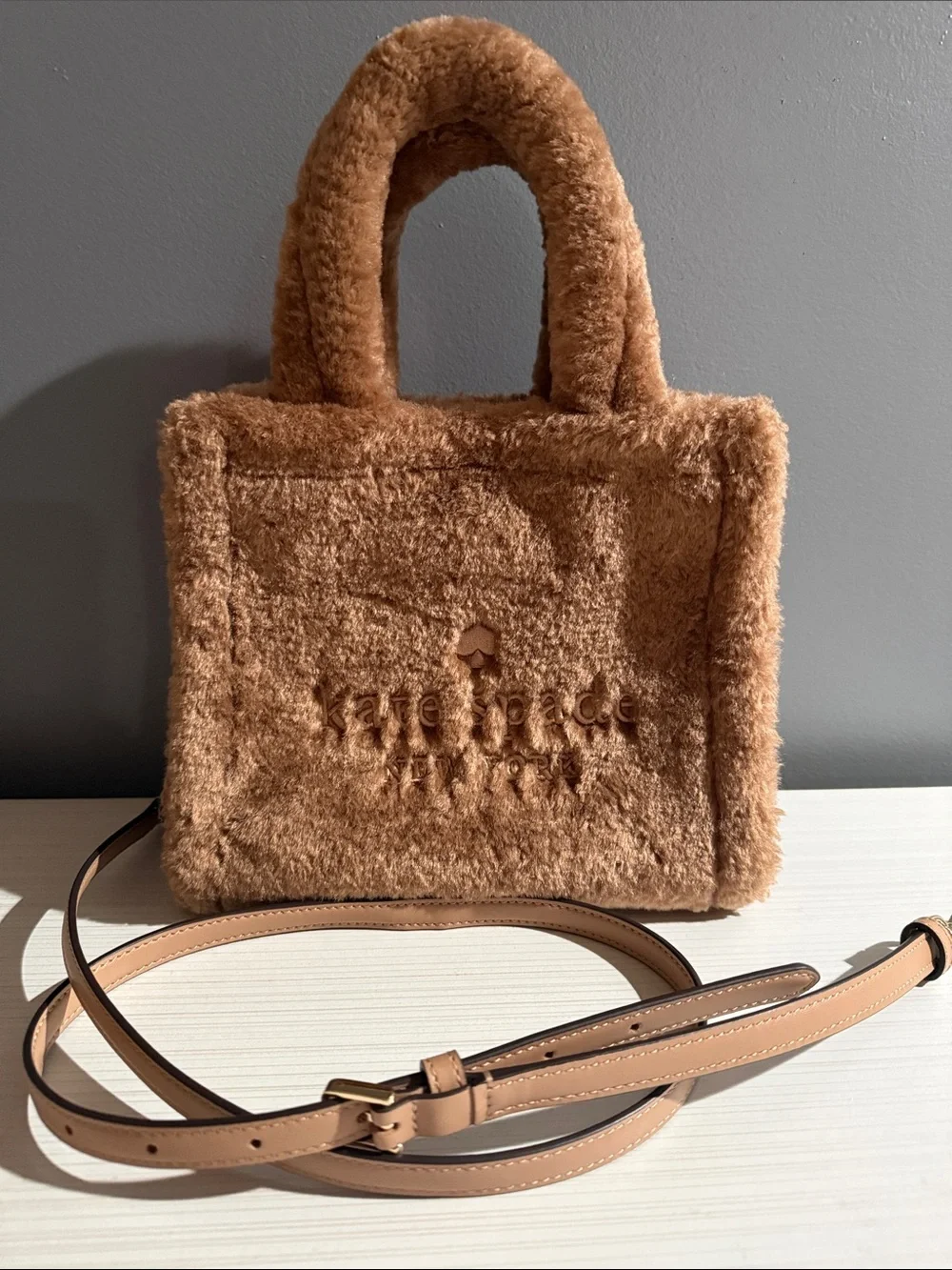 Kate Spade Ellie faux fur small tote features a soft, plush exterior - Picture 2 of 9